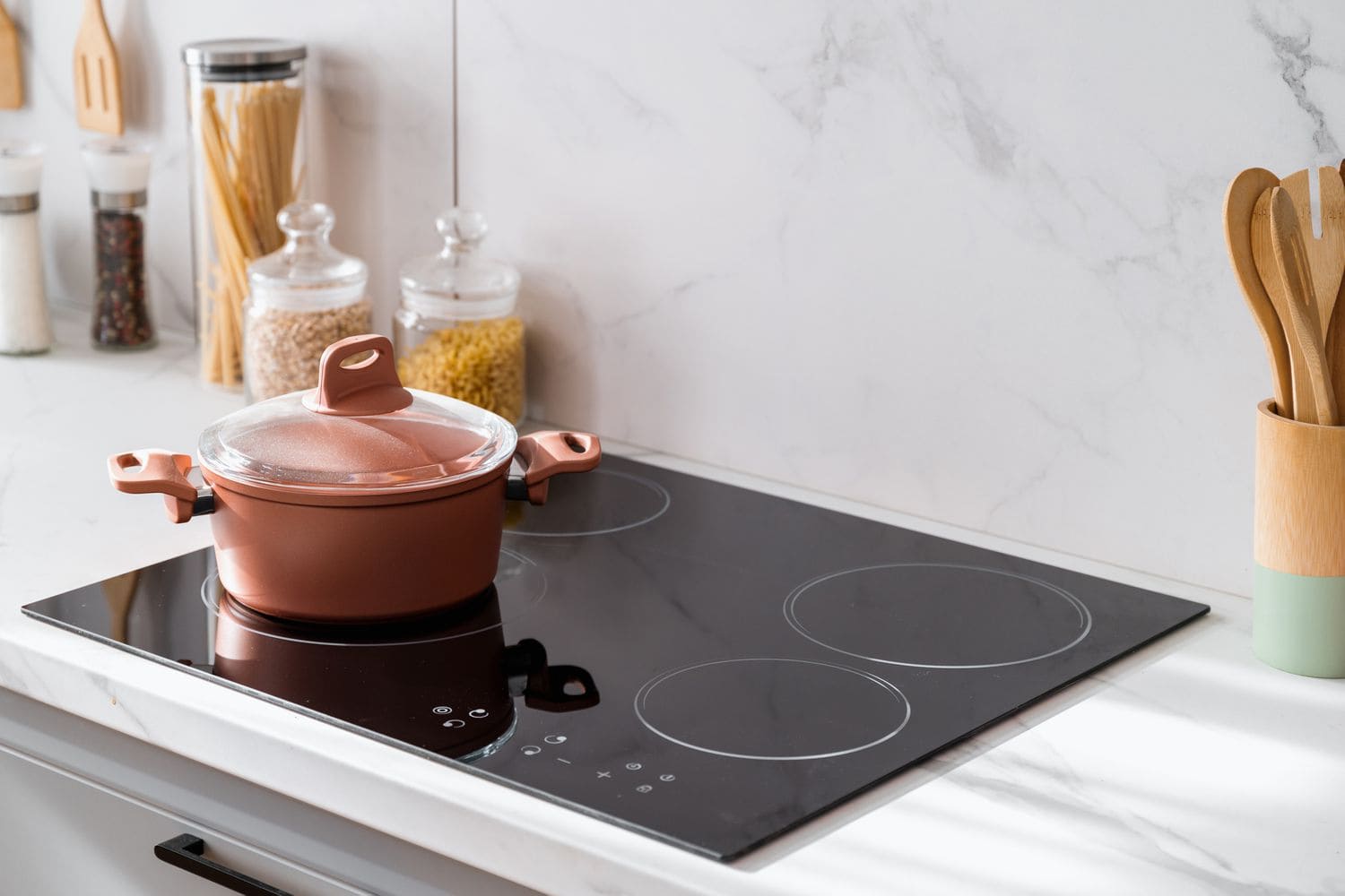 Electric cooktop burner heating unevenly or taking too long