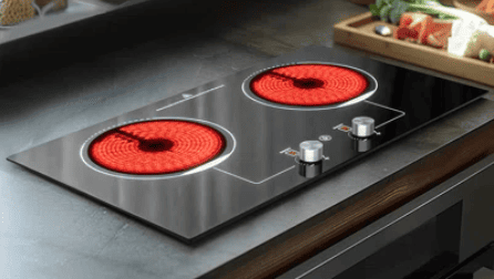 Electric cooktop surface discoloration or burn marks